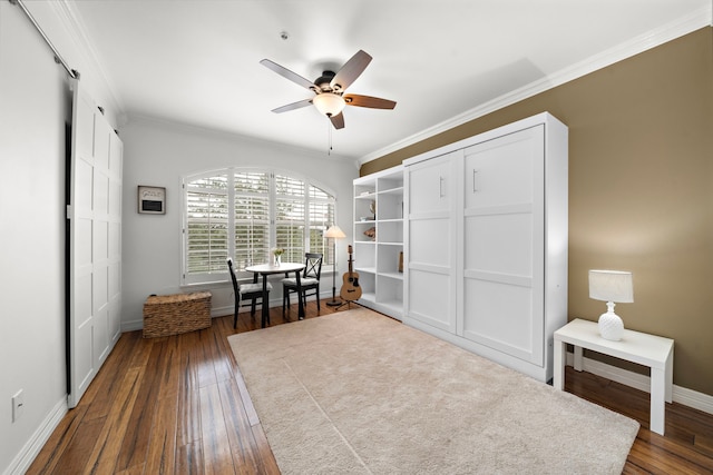 living area with a ceiling fan, baseboards, ornamental molding, and dark wood-style flooring