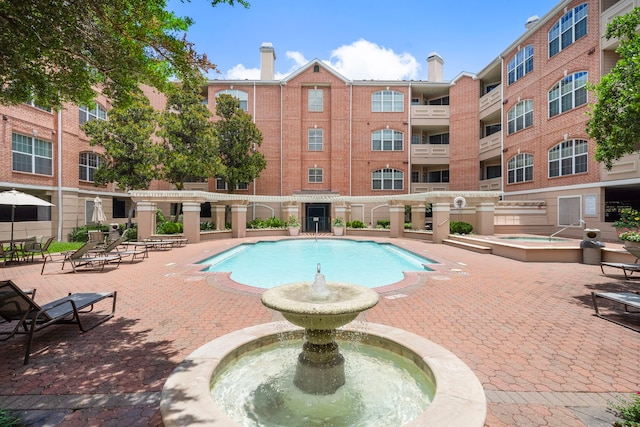 view of pool featuring a patio