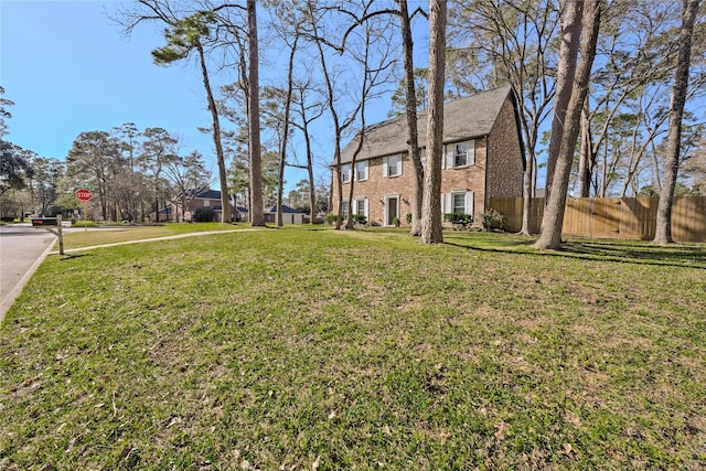 view of yard featuring fence