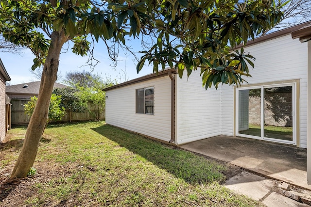 view of yard featuring a patio and a fenced backyard