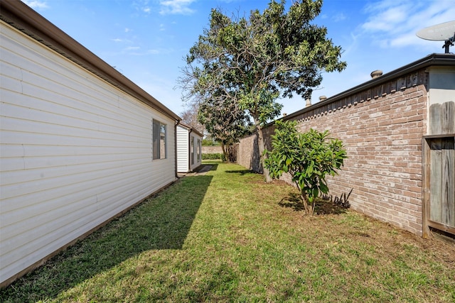 view of yard featuring a fenced backyard