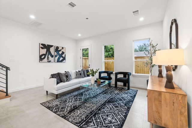 1016 Patton St, Houston, TX 77009 - living room featuring baseboards, visible vents, and recessed lighting