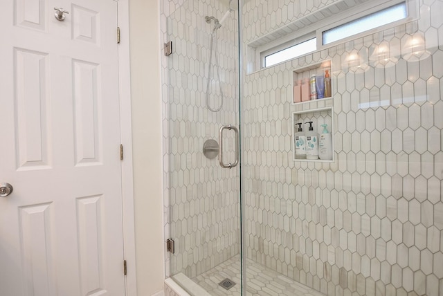 bathroom with a stall shower