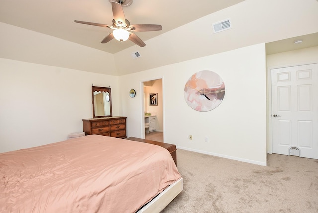 carpeted bedroom featuring vaulted ceiling, a ceiling fan, visible vents, and baseboards