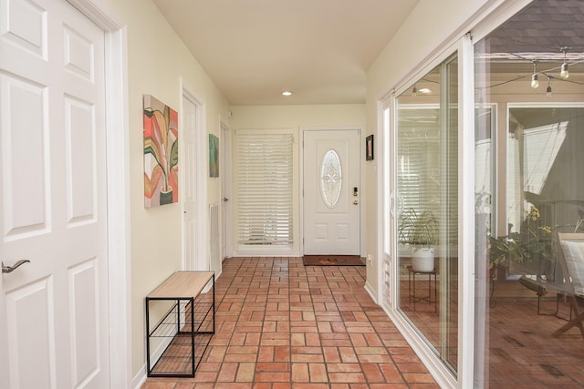 foyer with brick floor