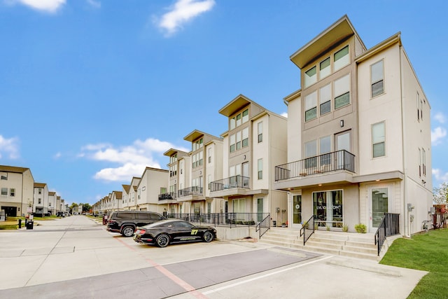 view of property with a residential view