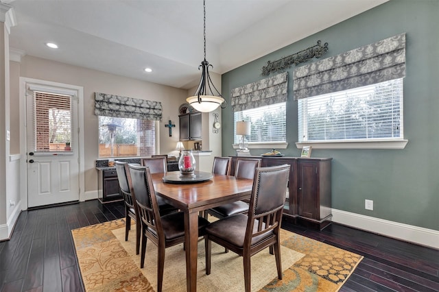 dining room with recessed lighting, dark wood-style floors, and baseboards