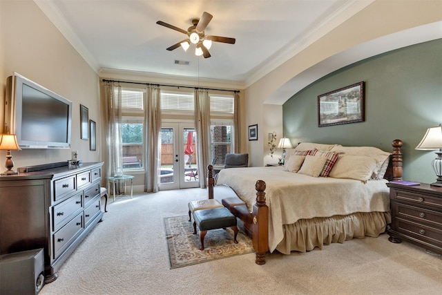 bedroom featuring light colored carpet, french doors, ornamental molding, and access to outside