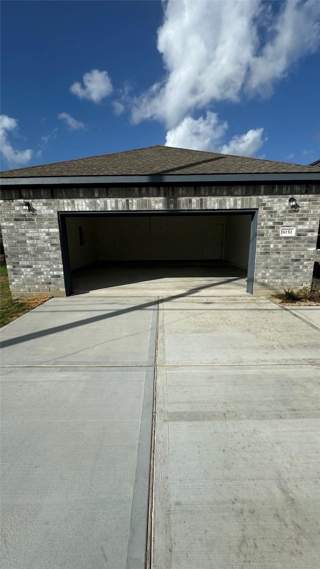 garage with driveway