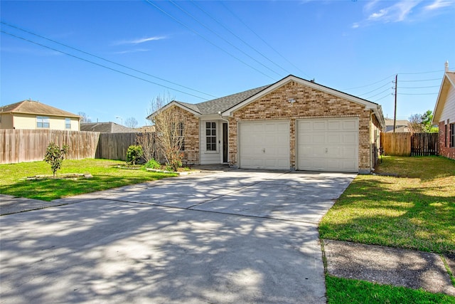 single story home with driveway, fence, a front lawn, and brick siding