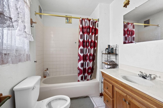 bathroom featuring shower / bath combo, vanity, toilet, and tile patterned floors