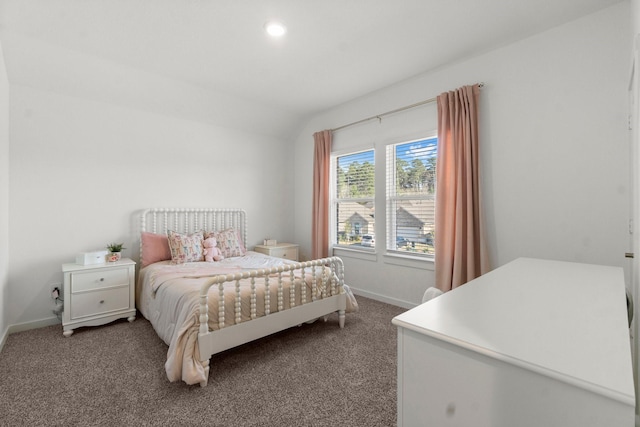 bedroom featuring lofted ceiling, carpet flooring, and baseboards