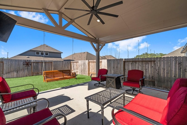 view of patio / terrace featuring a ceiling fan, outdoor lounge area, and a fenced backyard