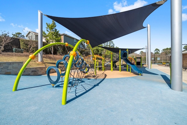 communal playground featuring fence