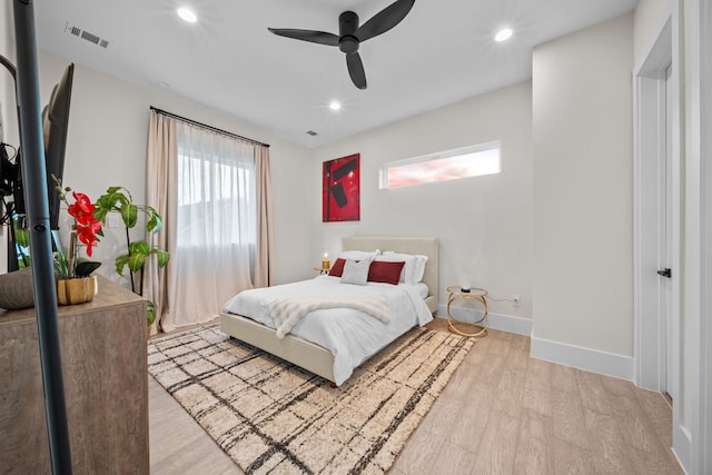 bedroom featuring baseboards, visible vents, ceiling fan, light wood-type flooring, and recessed lighting