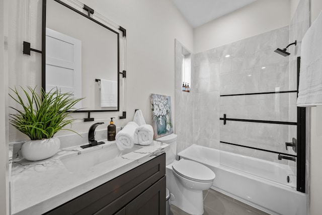 full bath with shower / washtub combination, tile patterned flooring, vanity, and toilet