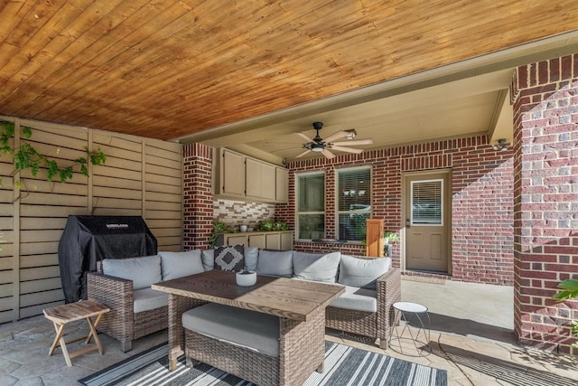 view of patio featuring outdoor lounge area and a ceiling fan