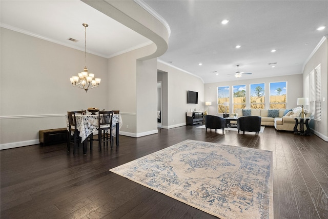 living area featuring baseboards, visible vents, ornamental molding, and dark wood-style flooring