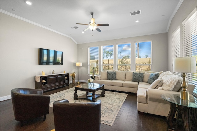 living room featuring baseboards, dark wood-type flooring, visible vents, and crown molding