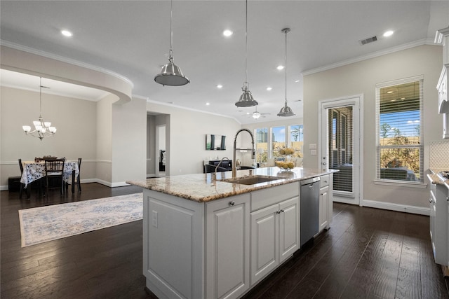 kitchen with dishwasher, dark wood-style flooring, a sink, and white cabinetry