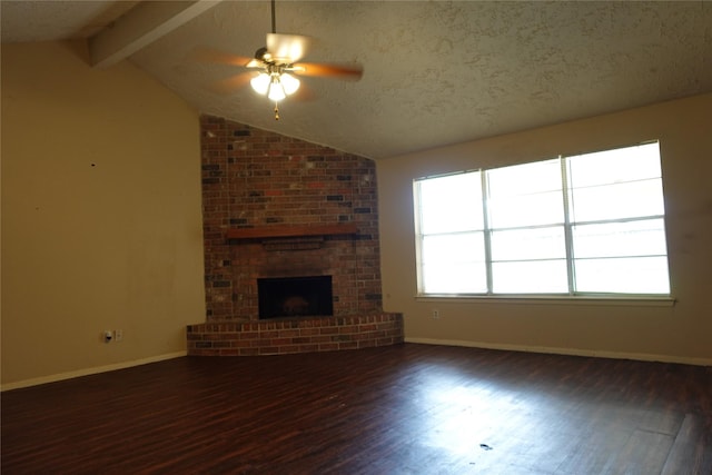 unfurnished living room with baseboards, vaulted ceiling with beams, wood finished floors, and a ceiling fan
