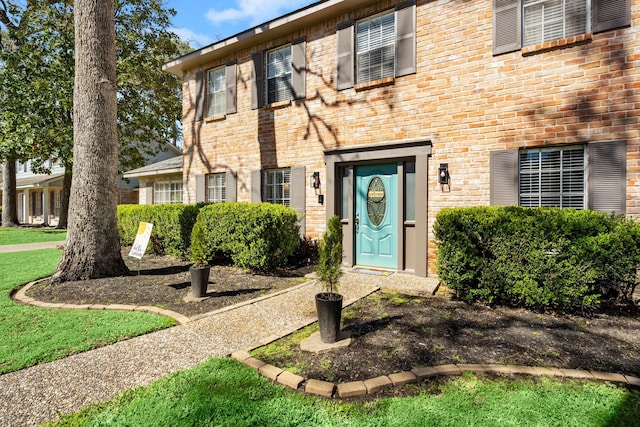 view of front of property with brick siding