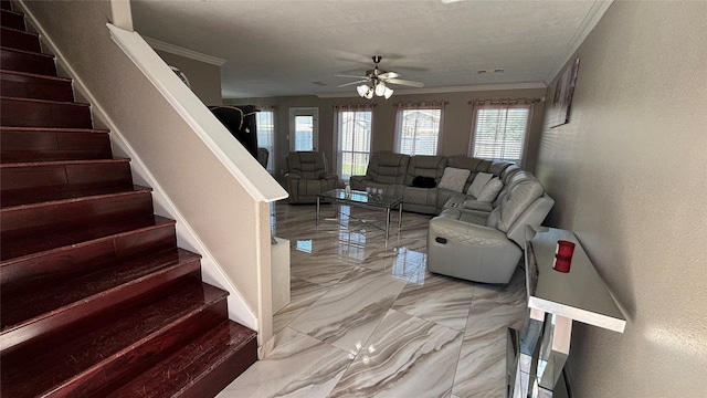 living room featuring a textured ceiling, a textured wall, stairs, marble finish floor, and ornamental molding