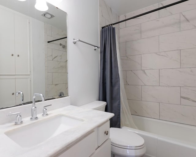 full bath featuring vanity, toilet, and shower / bath combo with shower curtain