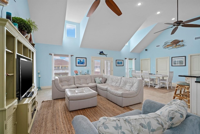 living area with a ceiling fan, french doors, visible vents, and light tile patterned flooring