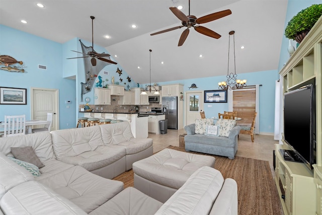 living room featuring ceiling fan with notable chandelier, visible vents, high vaulted ceiling, and recessed lighting