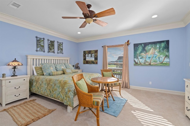 bedroom featuring crown molding, light colored carpet, visible vents, ceiling fan, and baseboards