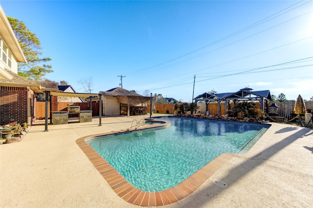 view of pool featuring a fenced in pool, a hot tub, a patio area, a gazebo, and a fenced backyard