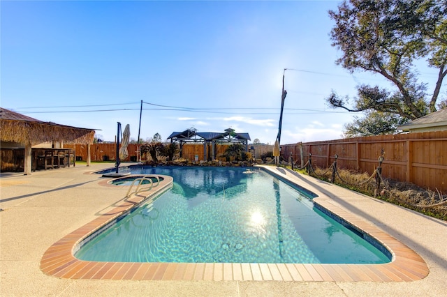 1016 Applewood Dr, Friendswood, TX 77546 - view of swimming pool with a gazebo, a fenced backyard, an in-ground hot tub, and a patio area