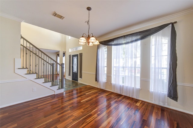 1016 Applewood Dr, Friendswood, TX 77546 - entryway featuring wood finished floors, a chandelier, crown molding, stairway, and baseboards