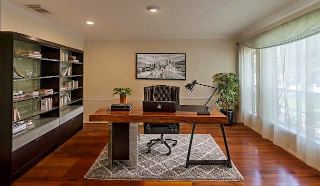 office with crown molding, visible vents, and dark wood-style floors