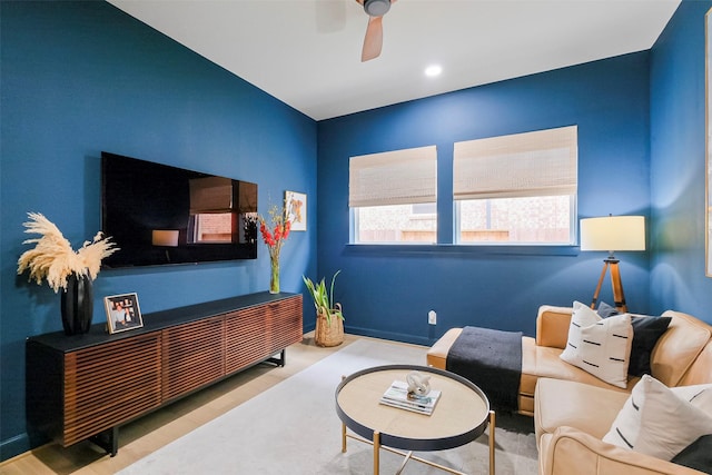 living room featuring a ceiling fan and recessed lighting