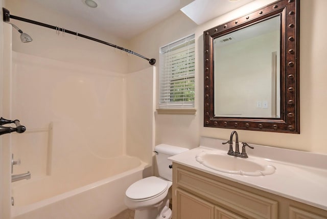 bathroom featuring visible vents, tub / shower combination, vanity, and toilet