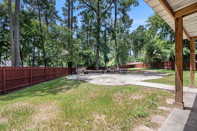 view of yard with a patio area and a fenced backyard