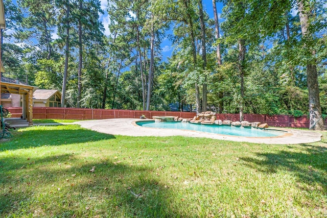 view of yard featuring a patio area, fence private yard, and a fenced in pool