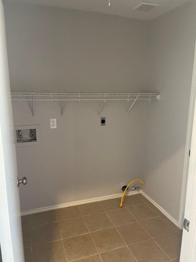 laundry room with washer hookup, visible vents, hookup for an electric dryer, laundry area, and baseboards