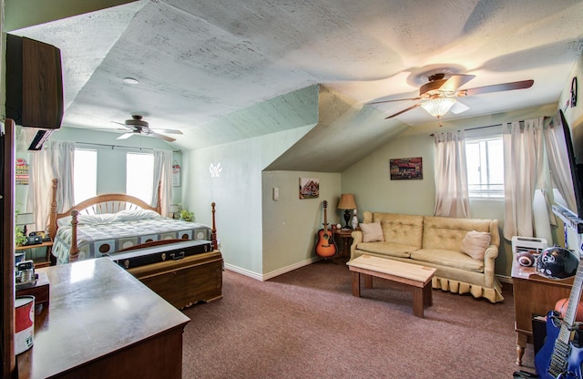 carpeted bedroom featuring lofted ceiling, ceiling fan, a textured ceiling, and baseboards