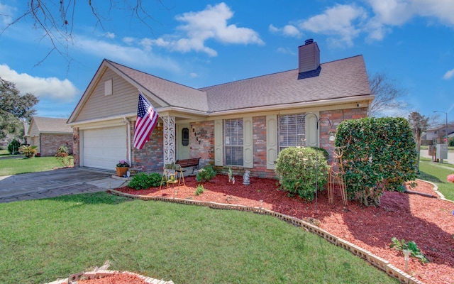 single story home featuring concrete driveway, a chimney, an attached garage, a front yard, and brick siding