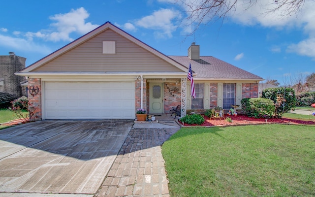 view of front of home featuring driveway, a garage, a chimney, a front lawn, and brick siding