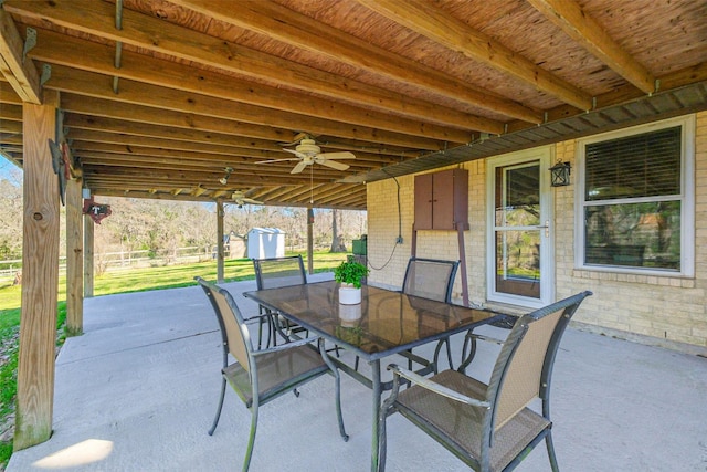 view of patio / terrace with outdoor dining area and a ceiling fan