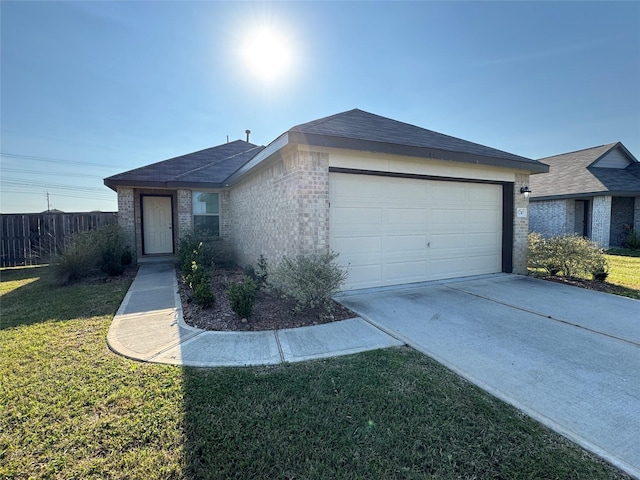 ranch-style home with brick siding, concrete driveway, an attached garage, fence, and a front lawn