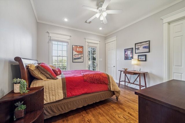 bedroom with ornamental molding, recessed lighting, a ceiling fan, and wood finished floors