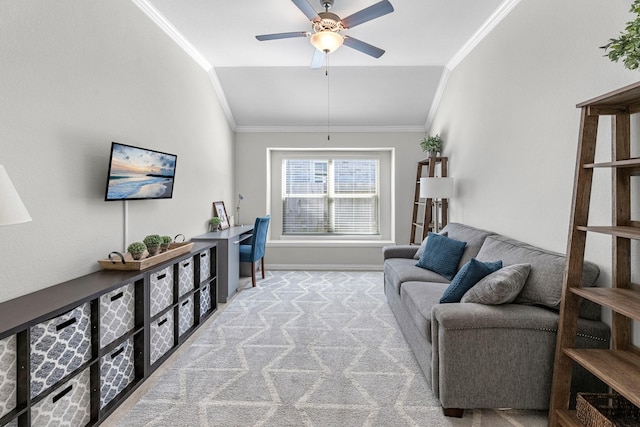 carpeted living area with lofted ceiling, ceiling fan, baseboards, and crown molding