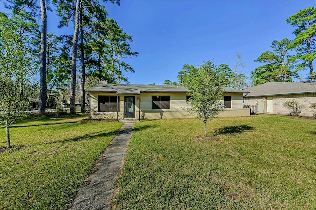 view of front of home with a front lawn