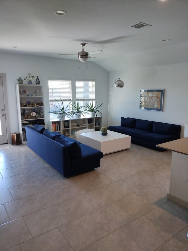 living room featuring light tile patterned floors, visible vents, lofted ceiling, ceiling fan, and recessed lighting