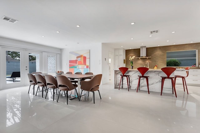 dining area featuring recessed lighting, visible vents, and french doors